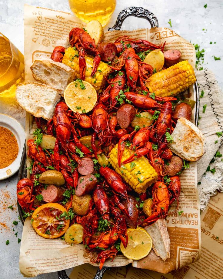 lobster and corn on the cob with beer