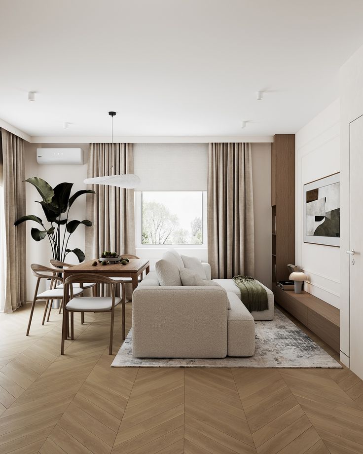 a living room filled with furniture and a wooden table in front of a large window