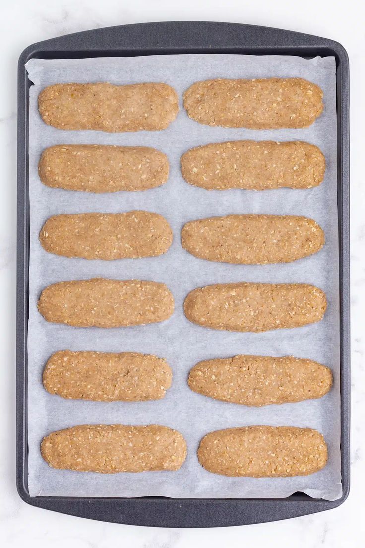 an uncooked batch of cookies on a baking sheet