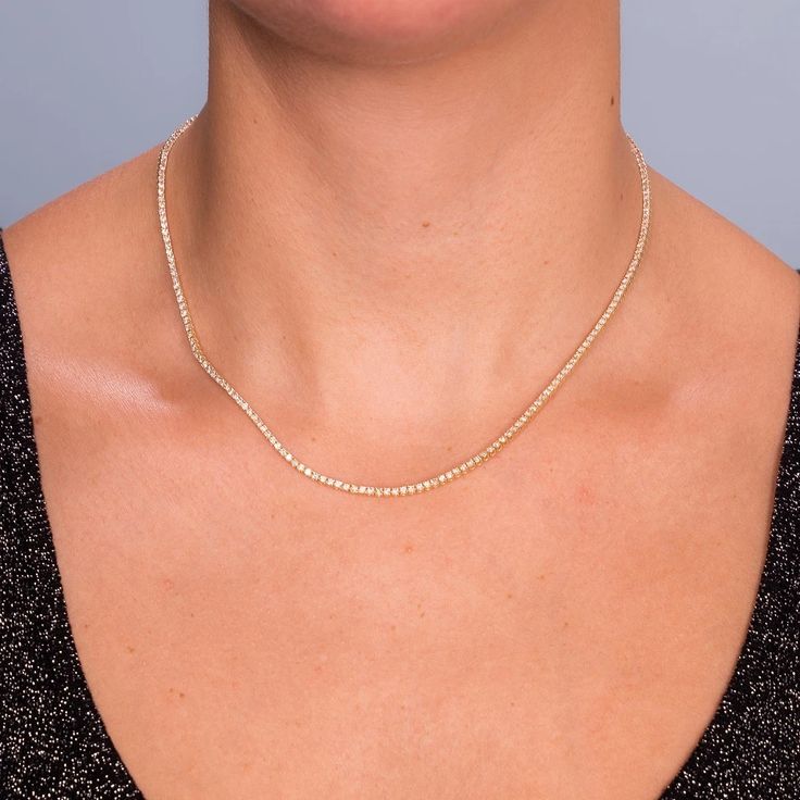 Handmade in New York of polished 14k white gold, CAPUCELLI's Tennis necklace showcases a delicate box chain embellished with dozens of shimmering white diamonds.Beautiful Diamond Tennis Necklace. A staple in your jewelry collection. Handmade in New York City of polished 14k white gold. This tennis necklace showcases a 14k Gold Single Strand Chain Necklace, Dainty Tennis Necklace With Diamond Accents, Dainty Tennis Necklace With Brilliant Cut, Dainty Gold Tennis Necklace For Formal Occasions, Dainty Round Brilliant Cut Tennis Necklace, Elegant Rose Gold Round Tennis Necklace, Elegant Rose Gold Tennis Necklace, Gold Elegant Tennis Necklace With Diamond Cut, Gold Diamond Cut Elegant Tennis Necklace