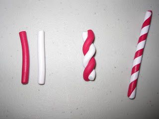 three candy canes are lined up next to each other