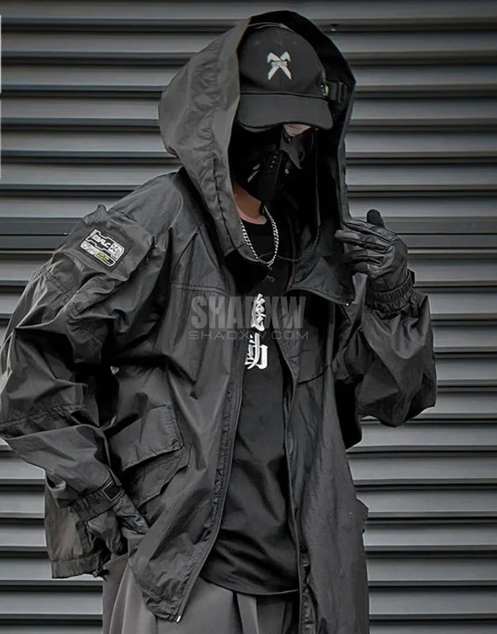 Style: Techwear jacket Design: Techwear, Ninja Techwear, Cyberpunk, Military, Futuristic Ultra-resistant Techwear Jacket: Made with premium materials that are resistant, flexible and lightweight to preserve your mobility while protecting you from rain and wind. Technical clothing: This techwear jacket is equipped with a multitude of storage pockets to easily carry your personal belongings. Breathable materials: This techwear jacket made of polyester, cotton and spandex can be worn all year round. Suitable for men Machine washable: 30 °C (86 °F) Size (cm | in) Bust Length M 151 | 59.4 72 | 28.3 L 155 | 61 74 | 29.1 XL 159 | 62.6 76 | 29.9 Embrace Summer with Techwear Style Navigate the city's summer whims with our Summer Techwear Jacket. Designed for breathability, it’s the perfect companio Breathable Functional Track Jacket For Streetwear, Functional Breathable Track Jacket For Streetwear, Urban Long Sleeve Parka For Streetwear, Breathable Nylon Track Jacket For Streetwear, Urban Winter Windbreaker For Streetwear, Black Utility Jacket For Urban Adventures, Casual Waterproof Windbreaker For Urban Adventures, Cyberpunk Black Windbreaker With Pockets, Black Techwear Track Jacket With Detachable Hood