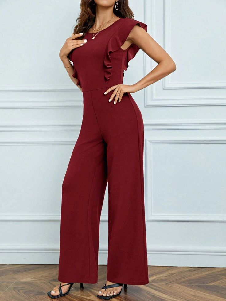 This feminine and stylish Trim Keyhole Back Jumpsuit is the perfect choice for any occasion. The high waistline and the regular fit create a flattering silhouette and the round neckline is sure to get you noticed. The knitted fabric of this dress is comfortable and lightweight, making it ideal for any occasion. The zipper closure ensures the perfect fit and makes it easy to take on and off. Specifications: Details: Ruffle, Zipper Sleeve Length: Cap Sleeve Fit Type: Regular Fit Waist Line: High Waist Neckline: Round Neck Material: Knitted Fabric Composition: 95% Polyester, 5% Elastane Care Instructions: Machine wash or professional dry clean Product Measurements(cm): Size US Bust Inseam Length Shoulder Sleeve Length Thigh Waist Size XS 2 80.50 77.00 150.40 34.00 9.00 59.60 64.50 S 4 84.5 77 Burgundy Jumpsuit, Cap Sleeve, Shoulder Sleeve, Round Neckline, Cap Sleeves, Knitted Fabric, Round Neck, Perfect Fit, Jumpsuit