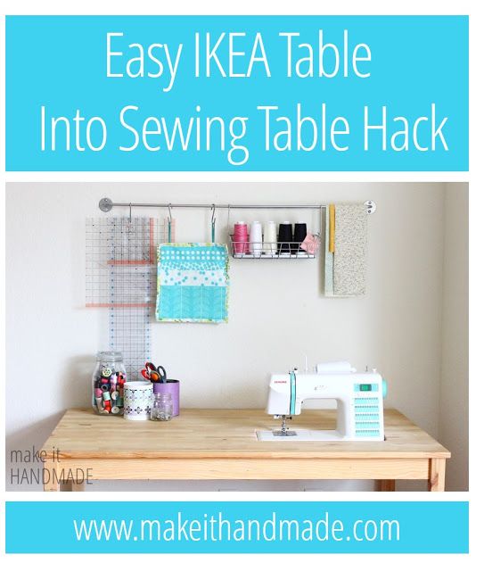 a sewing machine sitting on top of a wooden table next to a wall mounted shelf