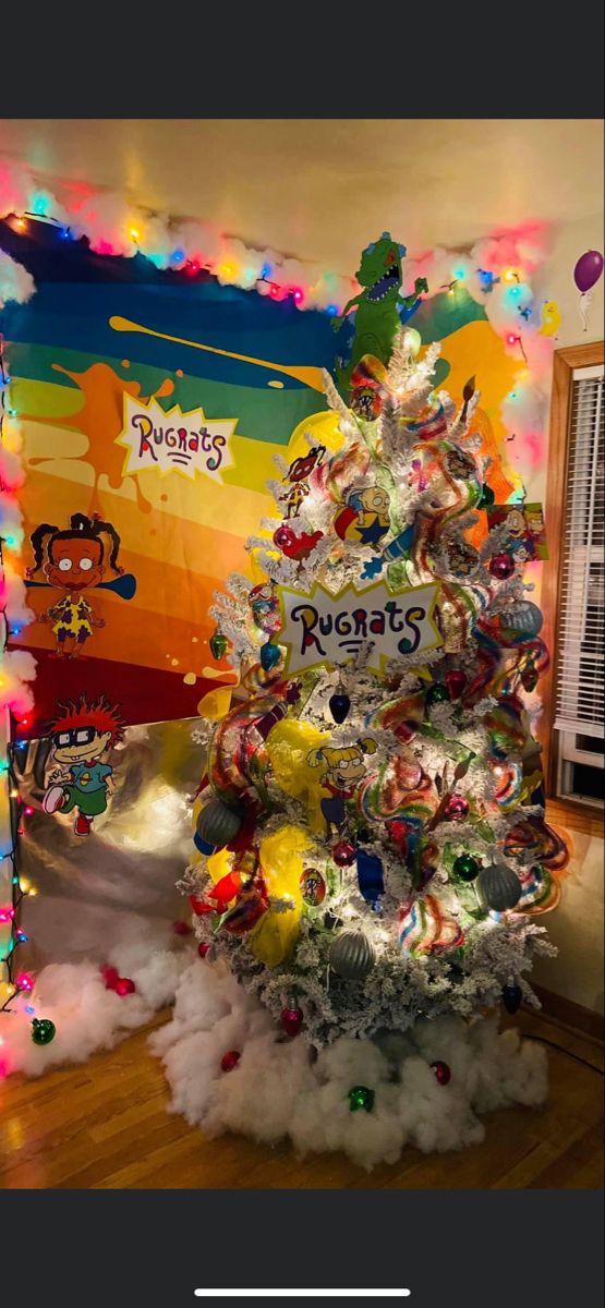 a decorated christmas tree in the corner of a room