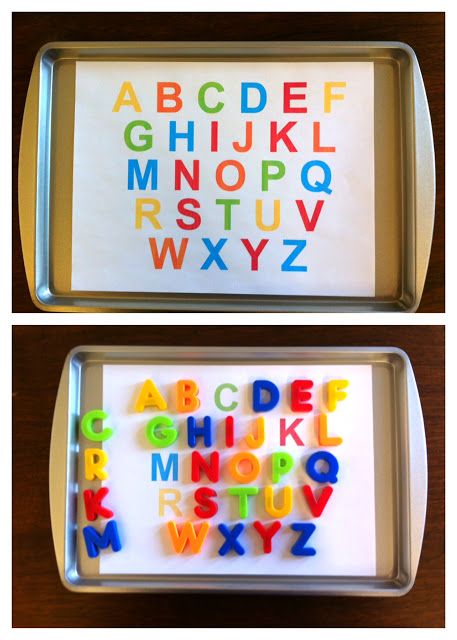 two trays with letters and numbers on them