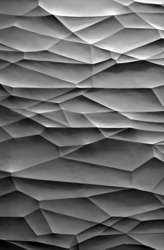 black and white photograph of an abstract wallpaper design that looks like paper or cloth