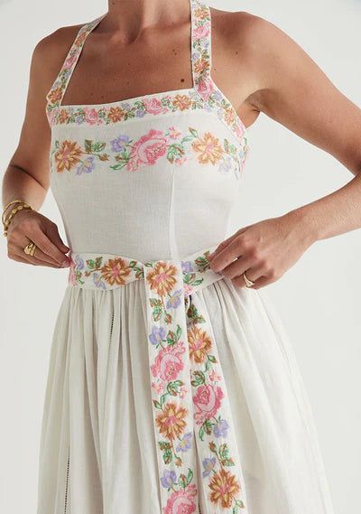 Transporting you to a European summer, the Ophelia Midi Dress has beautiful artisanal embroidery details, and a feminine silhouette. 55% Cotton 45% Linen Square Neckline Floral Embroidery detailing Side Zip Entry Adjustable Straps Fit: Model, Chelsea, is 180cm tall with a 81cm bust, 66cm waist, 91cm hips, and wears a size 8. Midi Jumpsuit, Barefoot Blonde, Tan Sandals, Weekend Plans, Midi Length Skirts, European Summer, Knit Shirt, Shirt Skirt, Embroidery Details