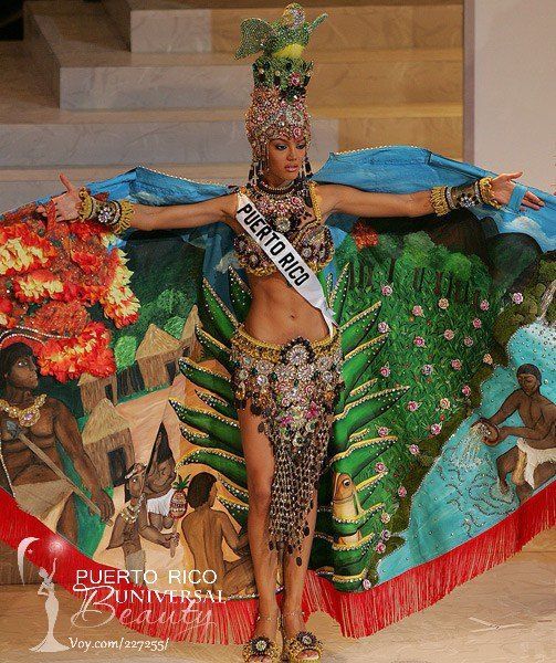 a woman in a costume on the runway