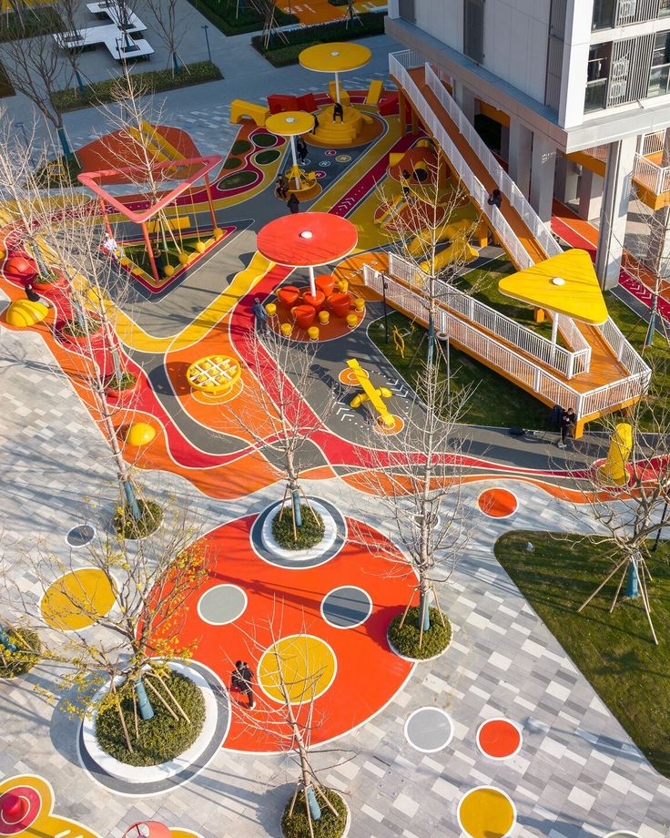 an aerial view of a colorful playground area