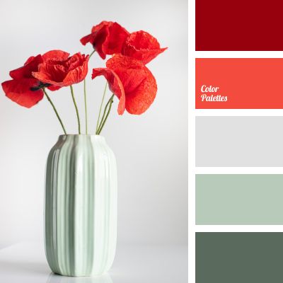 a vase with red flowers in it and the color palette swatches are all different