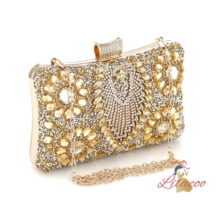 Possessing a handbag like this is a true testament to your exquisite taste and love for luxury. This dazzling clutch is designed to be the centerpiece of any glamorous ensemble. Its surface is encrusted with meticulously placed crystals and gems, creating a radiant, eye-catching effect that sparkles with every movement. The intricate floral patterns made from golden stones add a layer of sophistication and timeless elegance. The top clasp is equally adorned, ensuring that every detail of this ha Glamorous Handheld Evening Bag With Bling, Glamorous Embellished Evening Bag As Gift, Glamorous Embellished Evening Bag For Gift, Glamorous Bling Handheld Evening Bag, Gold Bags With Rhinestones For Gala, Glamorous Rectangular Embellished Evening Bag, Embellished Clutch Bag For Events, Elegant Handheld Evening Bag With Bling, Glamorous Bling Bags As A Gift