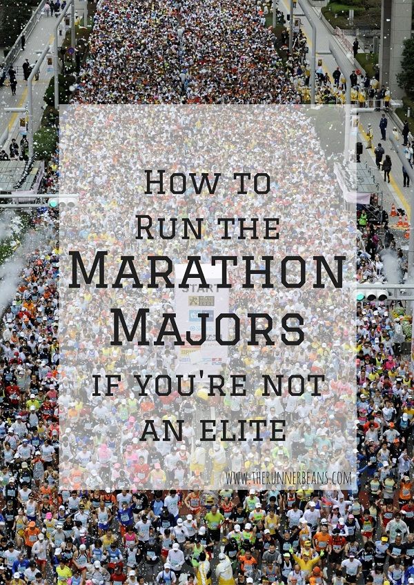 a large group of people walking down a street with the words how to run the marathon majors if you're not an athlete