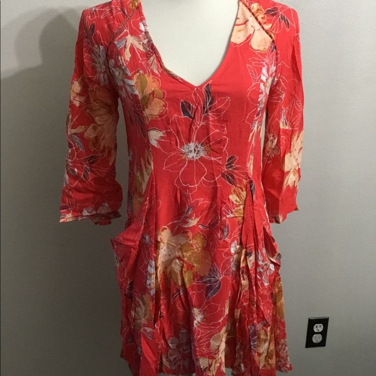 This Dress Is So Pretty. Willing To Trade For A Size 6. Vibrant Pink Color With Floral Print. Buttons In The Back. Hidden Side Zipper. Large Draped Side Pockets. Fully Lined Bust Approx. 18” Length Approx 32” From Shoulder To Bottom Casual Floral Print Dress With 3/4 Sleeves, Red 3/4 Sleeve Dress For Vacation, Rayon Dresses With 3/4 Sleeves For Spring, Red 3/4 Sleeve Beach Dress, Free People Boho Dress, Free People Boho, Free People Dress, So Pretty, Boho Dress