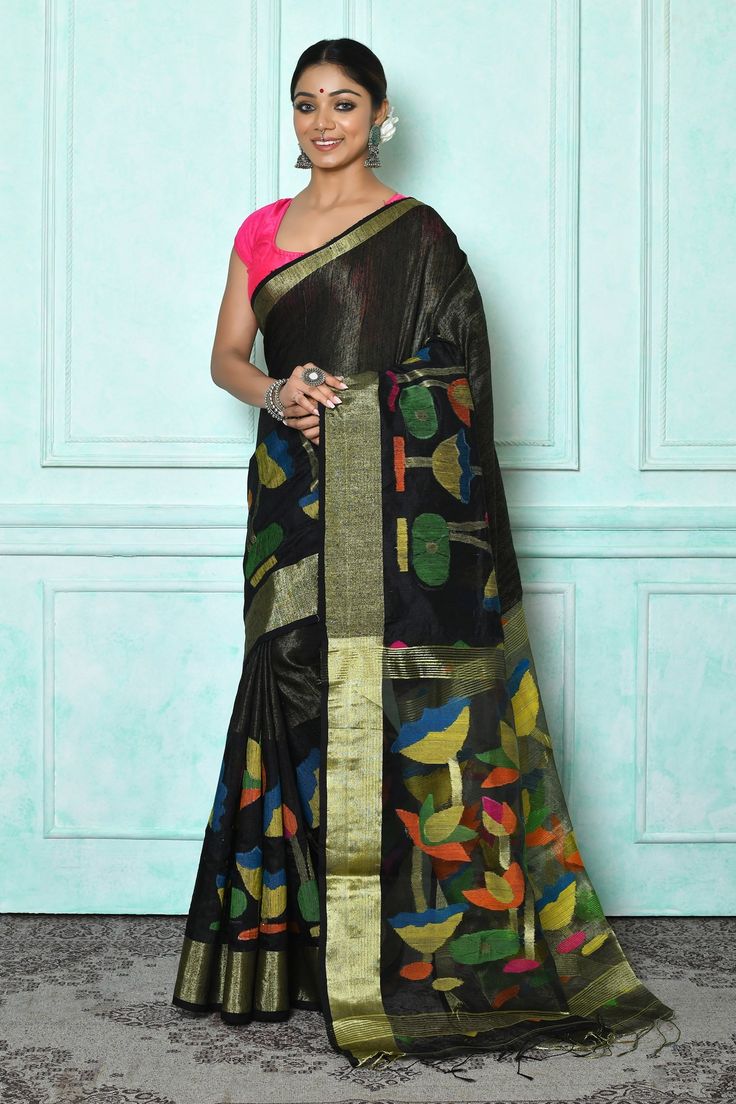 Black saree with floral jamdani woven and fringe pallu. Comes with running blouse.
Component: 1
Pattern: Woven
Type Of Work: Jamdani
Fabric: Matka Silk
Color: Black
Other Details: 
Saree: 6.5mtr
Note: Stitched blouse worn by the model is not for sale
Occasion: Wedding - Aza Fashions Jamdani Fabric, Sarees Black, Saree Black, Saree Women, Saree For Women, Black Saree, Sarees Online, Aza Fashion, Free Size