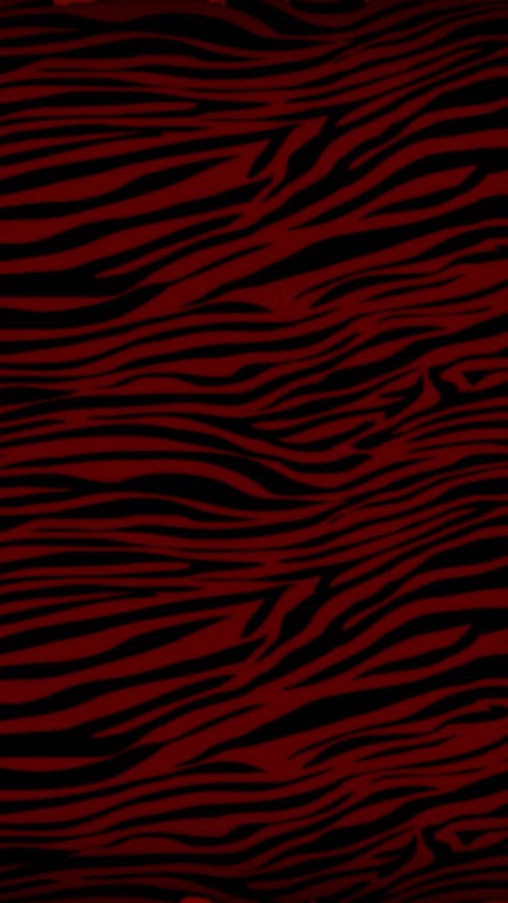 a red and black background with zebra stripes