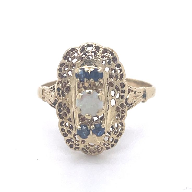 Antique Opal Ring, Vintage Sapphire ring, 14k Yellow Gold, Vintage Ring, Antique jewelry, Estate jewelry, vintage opal jewelry, jewelry gift Jewelry Yellow Gold 14k  (the gold has been tested by a professional) Total Carat Weight:0.28ct (Approx.) Total Metal Weight: 2.4g Size:6 US \ 16.51 mm (inner diameter) Antique 14k Gold Moonstone Wedding Ring, Vintage 14k Gold Filigree Ring With Gemstone, Vintage Multi-stone Opal Ring For Formal Occasions, Vintage 14k Stamped Opal Ring For Formal Occasions, Vintage 14k Stamped Opal Ring Gift, Vintage 14k Gold Moonstone Ring, Vintage White Cluster Ring With Gemstone, Antique 14k Yellow Gold Moonstone Ring, Vintage Opal Ring Stamped 14k