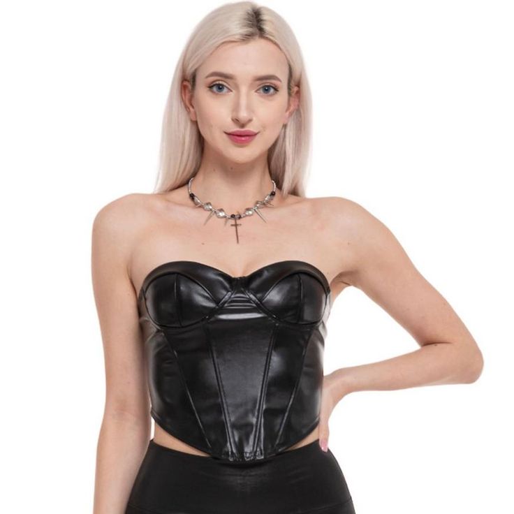 Start your DIY costume with this flattering black corset! The figure-hugging accessory has front pleats for a tapered waistline in an edgy faux leather fabric. The sky's the limit in this versatile top. pbBlack Faux Leather Corset product details:-b-p ul liFaux leather plastic and metal-li liBack zipper-li liDoes not include necklace pants or shoes-li liReview the size chart for sizing information-li -ul Edgy Fitted Corset For Costume Party, Fitted Faux Leather Corset For Club, Faux Leather Fitted Corset For Club, Faux Leather Corset With Corset Back, Faux Leather Corset For Club, Faux Leather Club Corset, Chic Faux Leather Party Corset, Chic Faux Leather Corset For Parties, Fitted Leather Corset Belt For Party