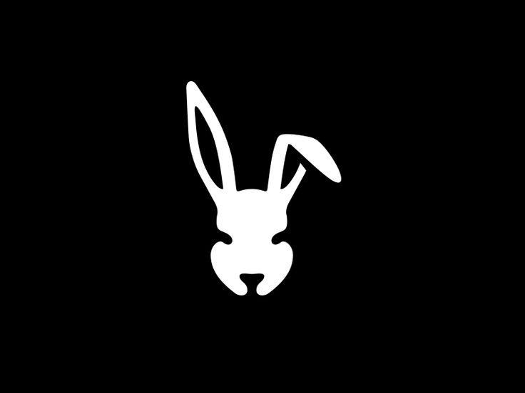 the silhouette of a rabbit's head is shown in white on a black background