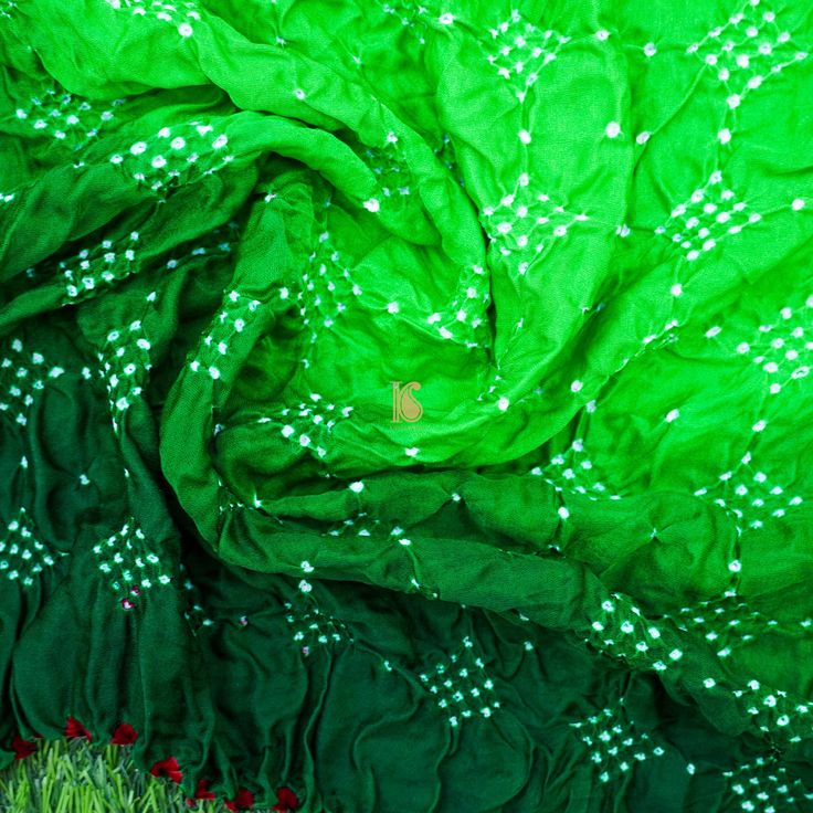 Category: Blouse Fabric Fabric: Gajji Silk Weave – Bandhani Color –Green Length – 1 meter Note- There may be slight color variations due to photographic reasons. This is a hand-woven product and any irregularities in the weaving or pattern should not be taken as a defect. These irregularities make every handloom piece unique. Festive Cotton Bandhani Print Blouse Piece, Festive Cotton Bandhani Blouse Piece, Green Bohemian Art Silk Traditional Wear, Bohemian Green Art Silk Traditional Wear, Green Blouse Piece With Motifs For Navratri, Cotton Bandhani Print Blouse For Navratri, Cotton Bandhani Blouse Piece For Navratri, Cotton Blouse Piece With Bandhani Print For Navratri, Bohemian Cotton Blouse With Cutdana