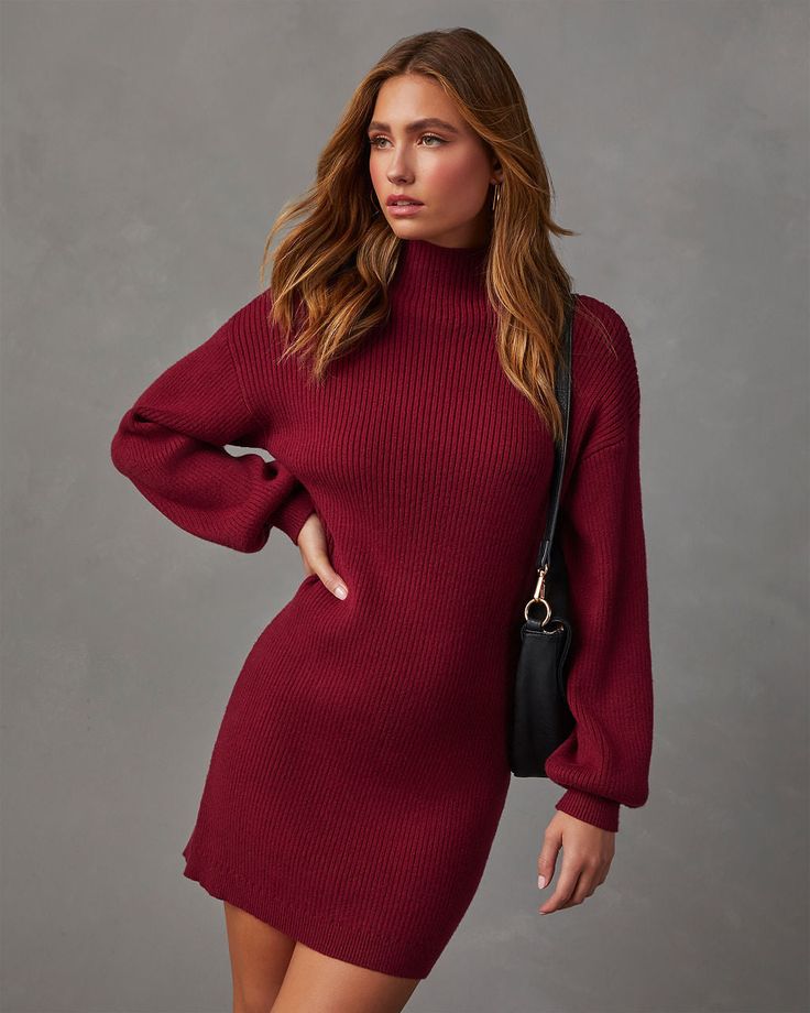 The Anastasia Mock Neck Knit Sweater Dress is serving cozy and chic vibes for any event on your calendar. Designed in a comfy, ribbed knit fabric with stretch, this mini-length dress has roomy, long sleeves and a mock neckline. We recommend styling it with ankle booties! Fits true to sizeMock necklineRoomy, long sleeves with elastic cuffsMini lengthRibbed knit fabric52% Rayon 29% Polyester 19% Nylon Fall Mini Sweater Dress Solid Color, Maroon Sweater Dress Outfit, Wine Colored Sweater Dress, Maroon Sweater Dress, Burgundy Sweater Dress, V-neck Knit Sweater Dress With Stretch, Western Wear Dresses, Burgundy Sweater, Mock Neckline