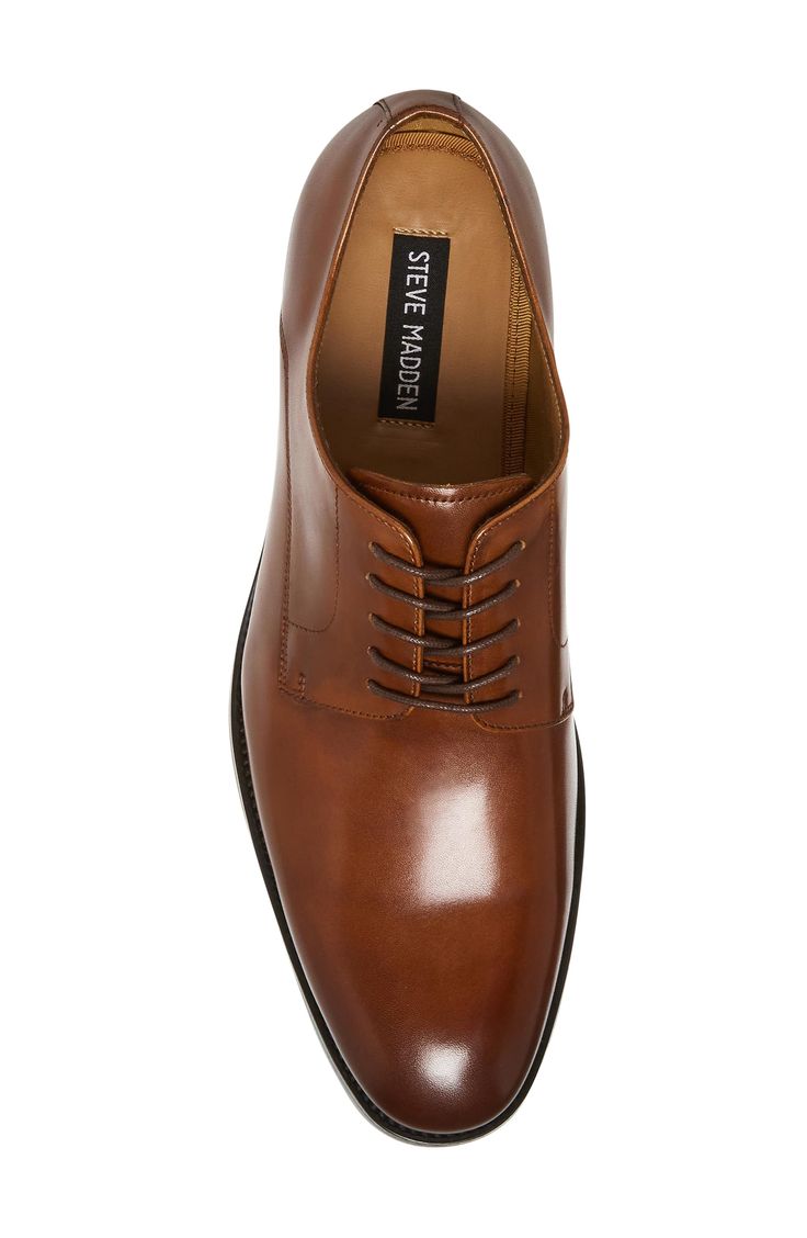 Add timeless refinement and elegance to your ensemble with this smooth leather derby grounded by a rubber sole for enhanced traction. Leather upper/textile and synthetic lining/rubber sole Imported Calf Leather Oxfords With Branded Insole For Derby, Derby Oxfords With Branded Insole And Calf Leather, Derby Oxfords With Almond Toe And Leather Lining, Almond Toe Oxfords With Leather Lining For Derby, Timeless Oxfords With Branded Insole For Derby, Oxford Lace-up Shoes With Leather Lining For Business, Classic Calf Leather Lace-up Shoes For Business Casual, Classic Lace-up Shoes With Almond Toe And Textured Sole, Leather Lined Round Toe Oxfords For Derby