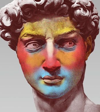 a man's face is covered in multicolored paint and has curly hair