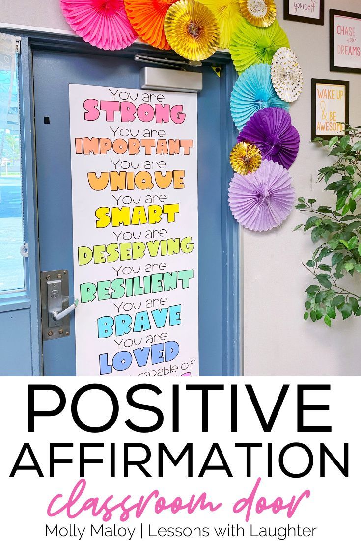 a classroom door decorated with paper fans and the words positive affirmation