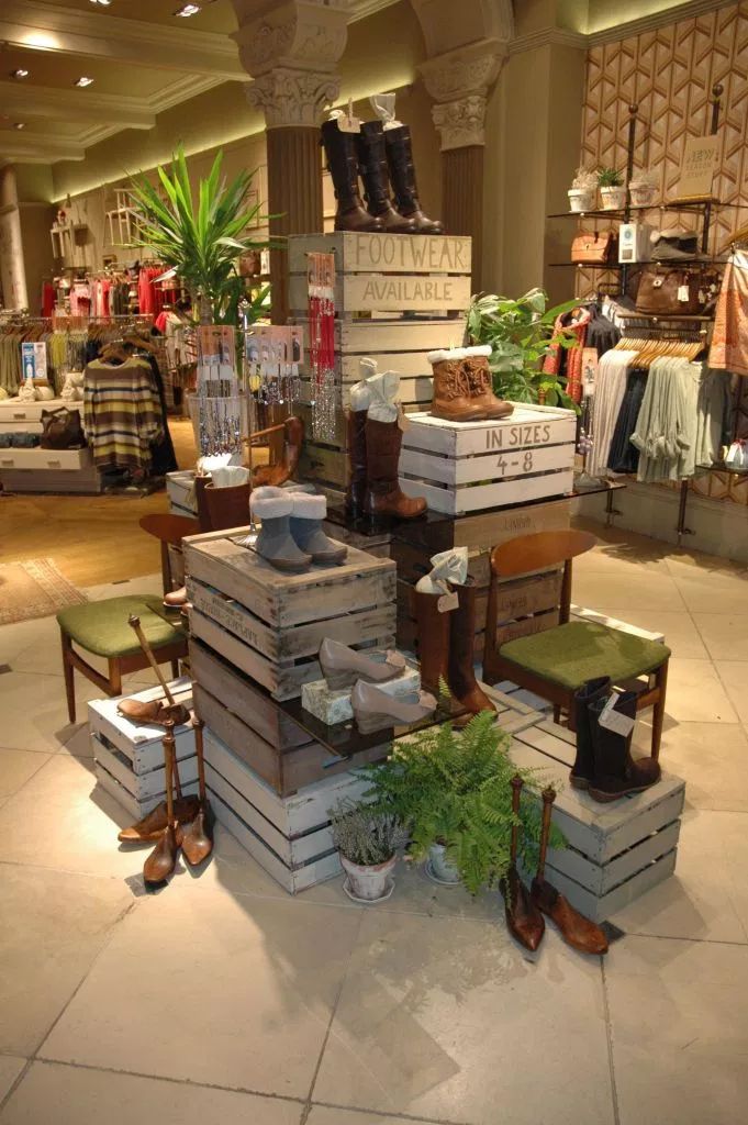 a pile of luggage sitting on top of a tiled floor