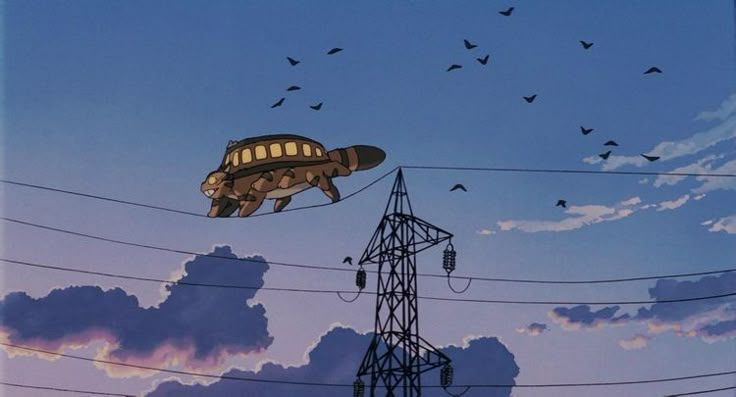 an animal floating on top of power lines in the sky with birds flying around it