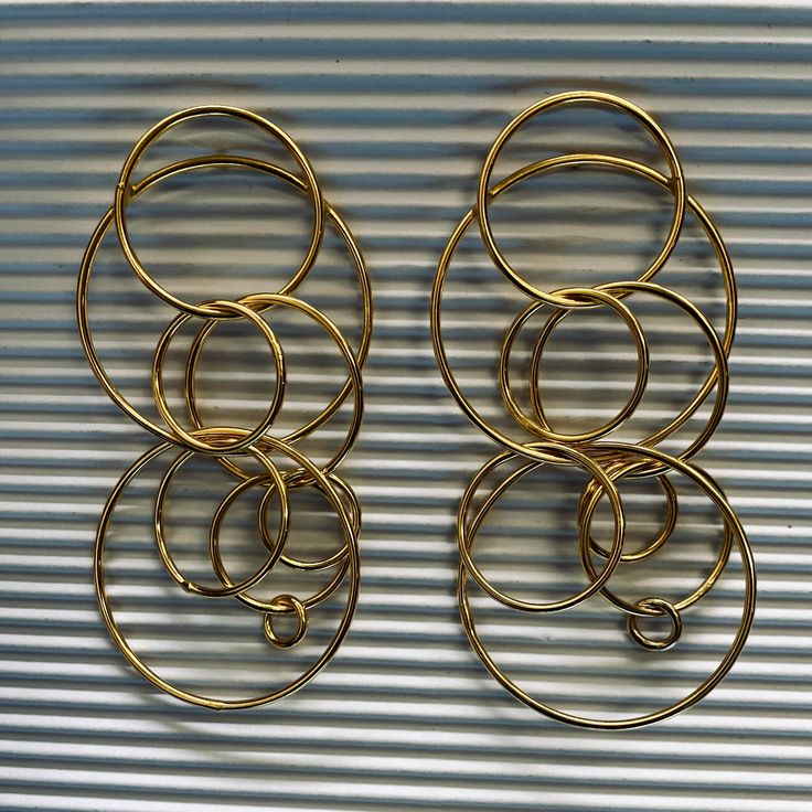 These hoop earrings are the perfect pair of earrings to dress up your outfit. Material: Gold plated Length: 7 cm Yellow Gold Metal Hoop Earrings For Parties, Small Hoop Gold Plated Earrings For Party, Gold Round Hoop Earrings, Gold Plated Yellow Gold Hoop Earrings For Party, Yellow Gold Plated Hoop Earrings For Party, Gold-tone Gold Plated Hoop Earrings, Gold-tone Gold-plated Hoop Earrings, Gold Plated Small Hoop Earrings For Party, Gold-tone Hoop Earrings For Party