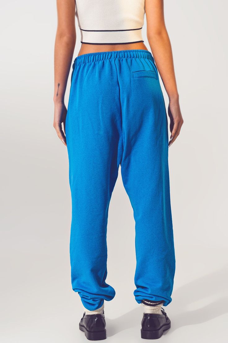 Stay comfy and stylish with these Blue Oversized Joggers with Tie Waist from Szua Store. Made with 100% cotton, these joggers are perfect for a casual day out or lounging at home. Fabric & Fit: 100% cotton Model is wearing size U Runs true to size Relaxed fit for a comfortable and easy-to-wear look Full length for a classic style Sweatshirt fabric for a cozy feel Model Info: Measurements: 31-22-34 Height: 5' Key Features: Jogger style for a casual and laid-back look Straight leg for a versatile Sweatshirt Fabric, Blue China, Fashion Joggers, Knitwear Tops, Casual Everyday, Sweatshirt Dress, Belted Dress, Alternative Fashion, High Waisted Pants