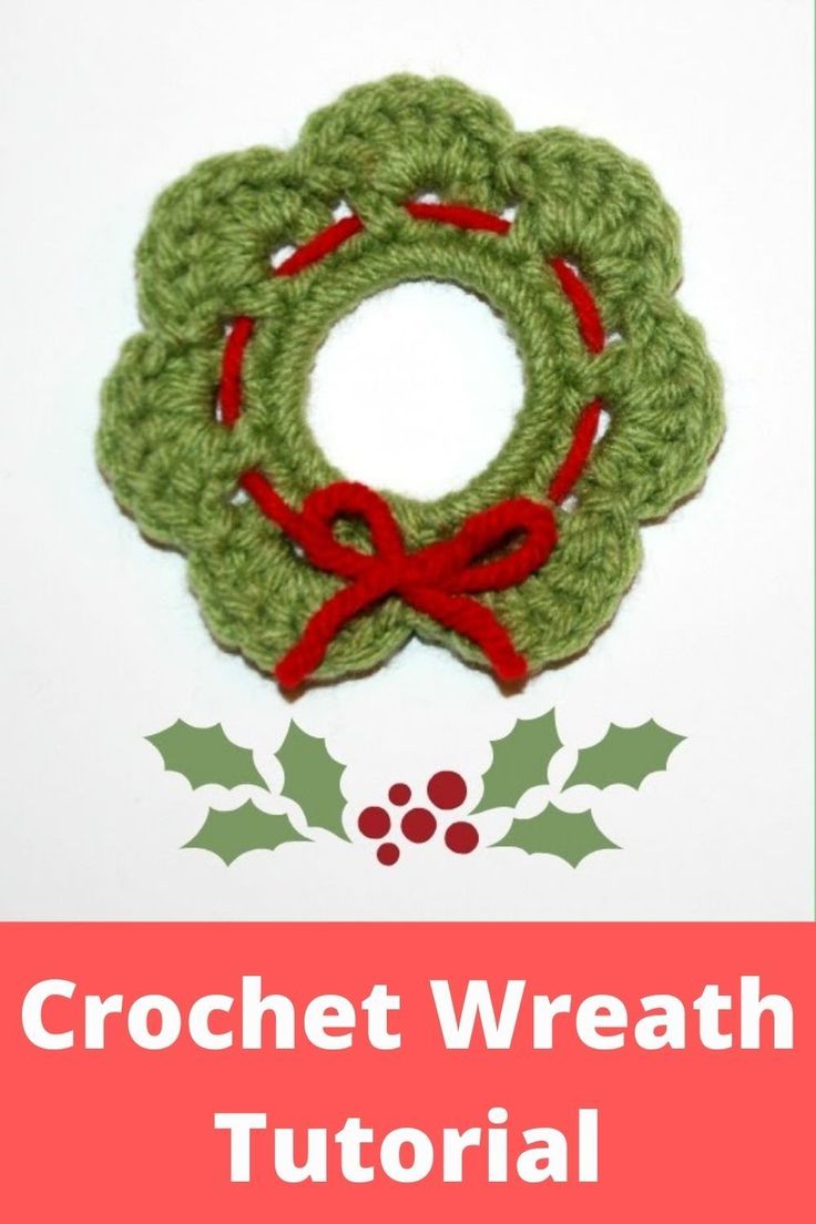 the crochet wreath is shown with holly and red ribbon around it, on top of