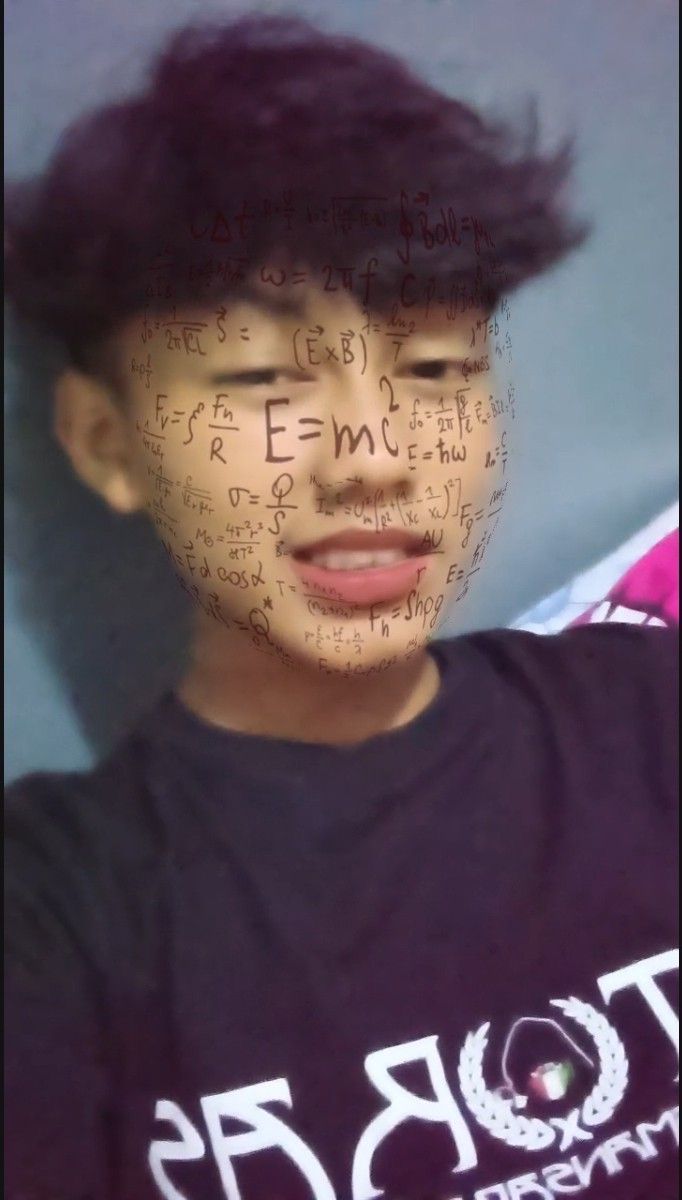 a young man with writing all over his face