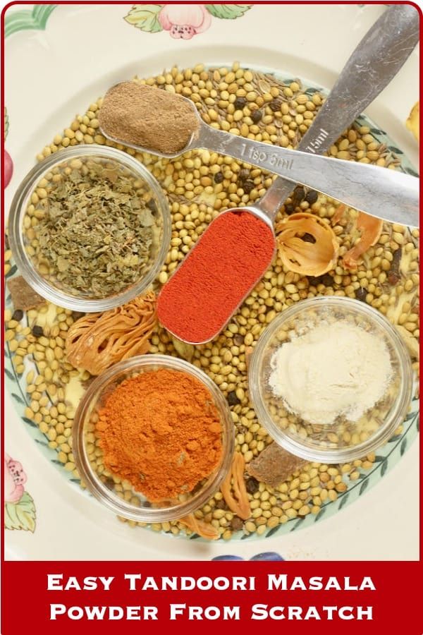 an assortment of spices on a plate with the words easy tandori masala powder from scratch