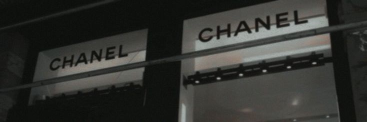 a chanel store front window with the words chanel on it