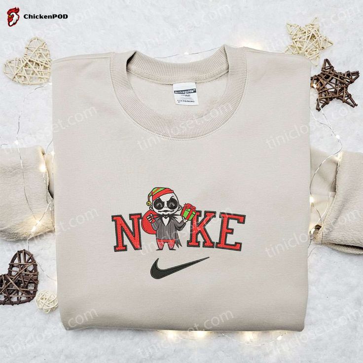 The Nike Christmas x Chibi Jack Santa Embroidered Sweatshirt is the perfect festive attire to elevate your holiday style. Featuring a charming Chibi Jack Santa embroidery, this sweatshirt combines comfort and style effortlessly. Made from high-quality materials, it ensures durability and a cozy feel. The sweatshirt’s relaxed fit allows for easy movement, making it ideal [...] Nike Cartoon, Disney Character Shirts, Best Family Gifts, Georgia Southern, Disney Hoodies, Patrick Star, Halloween Hoodie, Merry Christmas Shirts, Jason Voorhees