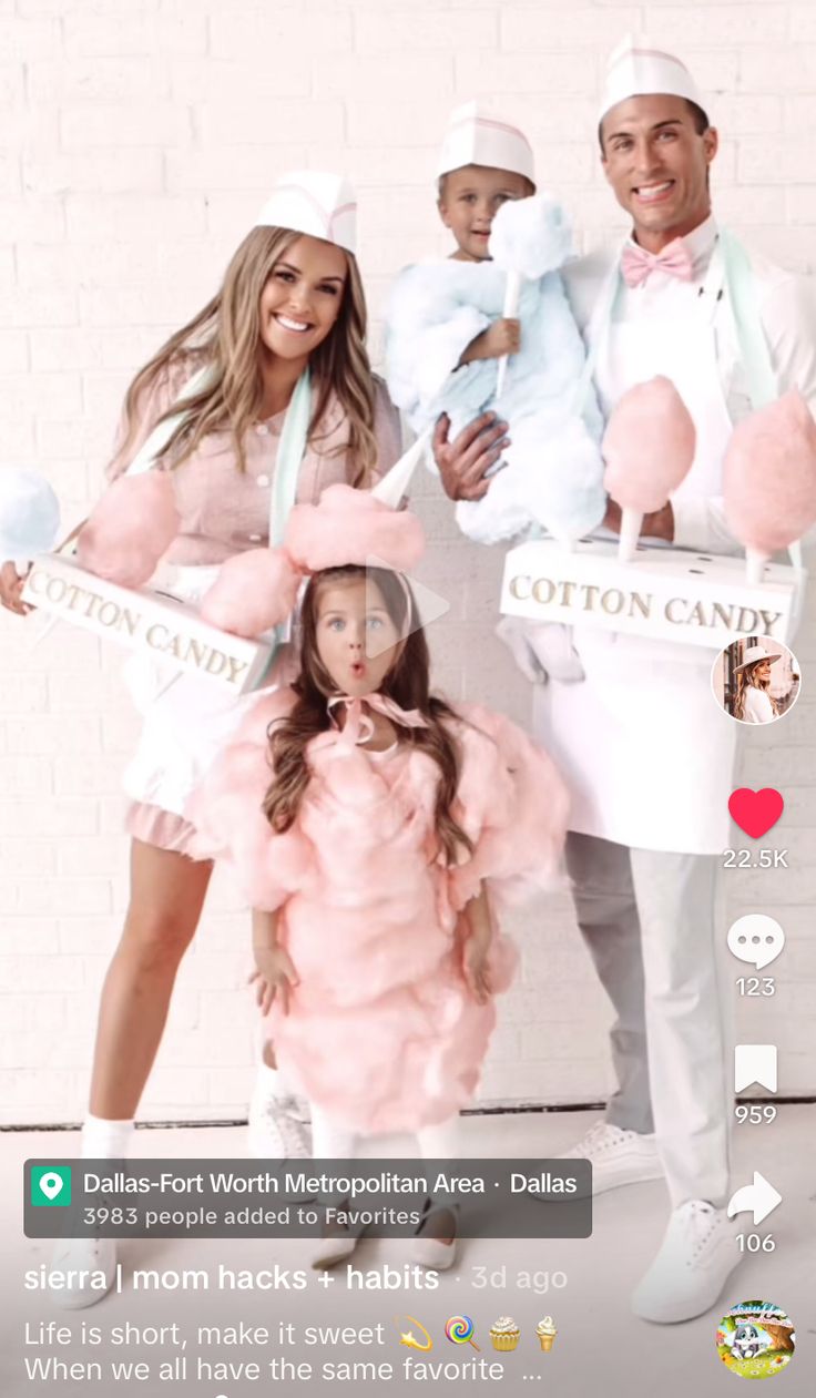 the family is dressed up as cotton candy and posing for a photo with their baby