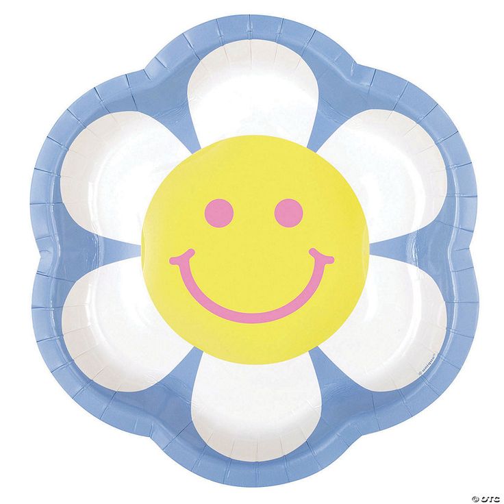 a blue and white flower shaped paper plate with a smiley face painted on the center