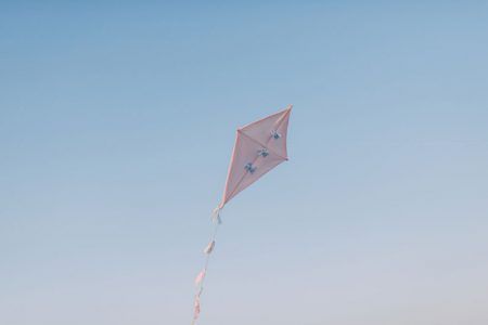 a person flying a kite in the sky