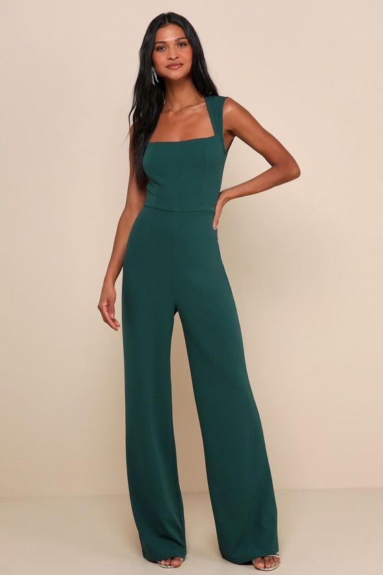 With a chic blazer, leather jacket, or coat, there's no end to how you could style the Lulus Enticing Endeavors Emerald Green Jumpsuit! This sleeveless jumpsuit is made from lightly textured crepe knit with a squared-off neckline, and seamed bodice. High-waisted pant legs fall to a classic wide cut. Hidden back zipper. Fit: This garment fits true to size. Length: Floor length. Size medium measures 61.75" from shoulder to hem. Inseam: 33.00 Front Rise: 14.25 Bust: Great for any cup size. Waist: F Graduation Jumpsuit, What Is Cocktail Attire, Emerald Green Jumpsuit, Cocktail Wedding Attire, Lulus Jumpsuit, Jumpsuit For Wedding Guest, Jumpsuit Fall, Chic Blazer, Jumpsuit Chic