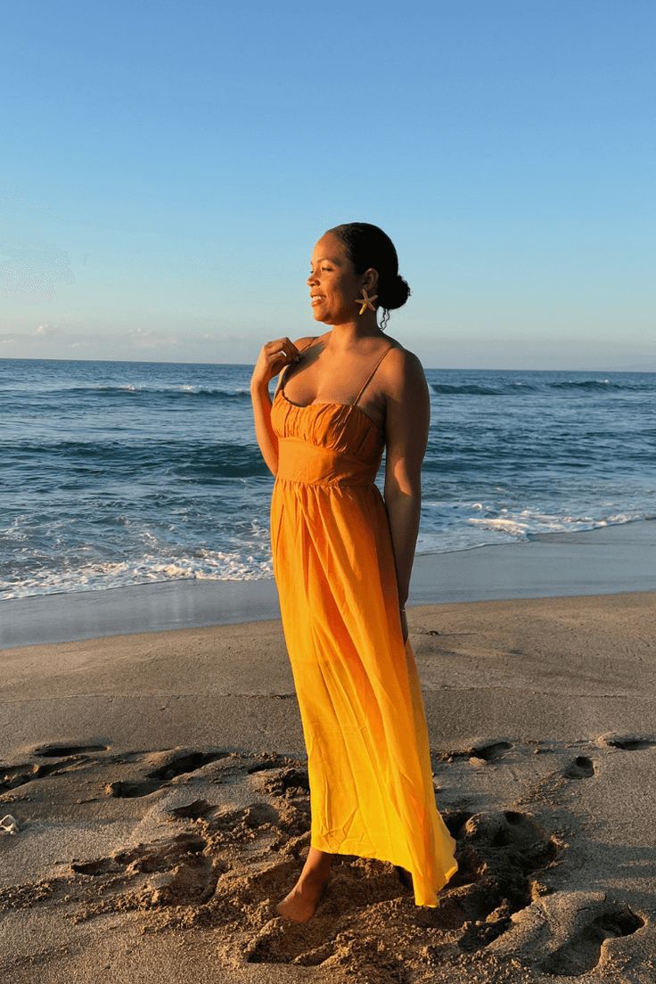 The perfect vacation dress does exist - meet our Wailea Sunset Ombre Maxi Dress! Available in orange and pink, this dramatic ankle-sweeping maxi dress features gorgeous ombre fabric that fades from rich burnt orange to butter yellow, adjustable spaghetti straps and an empire waist. We're pairing with a dramatic gold earring and low bun for your best vacation look yet. 65% Cotton 35% Polyester Ombre Midi-length Summer Dress, Orange Vacation Dress With Adjustable Straps, Orange Dress With Adjustable Straps For Vacation, Orange Beach Dress With Adjustable Straps, Spring Orange Maxi Dress For Beach Party, Orange Maxi Dress For Spring Beach Party, Orange Sundress Maxi Dress For Beach Cover-up, Yellow Maxi Dress For Beach Party, Orange Spaghetti Strap Summer Maxi Dress