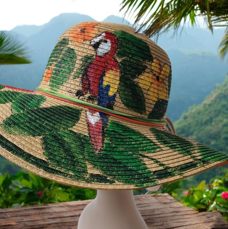 Express yourself in this jungle themed floppy hat.  Great for the beach, the afternoon walk, the beach, and the walk at the mall!  From the Serengeti Collection. At The Mall, Centre Commercial, The Walk, Beach Themed, Beach Themes, Sun Hats, Floppy Hat, Parrot, Caps Hats