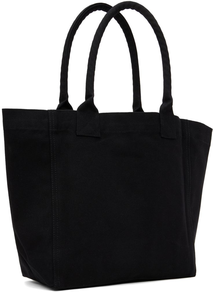 Nylon canvas tote in black. · Rolled shoulder straps · Logo flocked at face · Open throat · H12.5 x W19.5 x D4.75 Supplier color: Black Black Rectangular Canvas Bag With Canvas Lining, Black Double Handle Bag With Canvas Lining, Black Shopping Bag With Canvas Lining, Modern Black Canvas Bag For Errands, Black Cotton Shoulder Bag With Canvas Lining, Black Canvas Bag With Double Handle, Black Cotton Canvas Bag With Reinforced Handles, Black Canvas Tote Bag With Reinforced Handles, Black Double Handle Canvas Bag