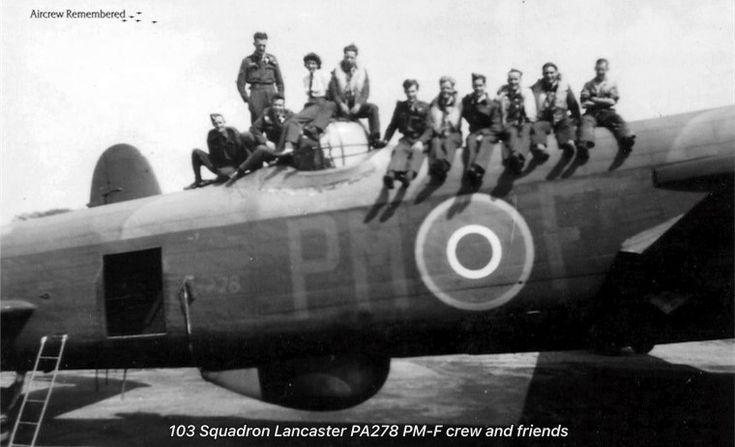 an old black and white photo of men in uniforms sitting on top of a plane