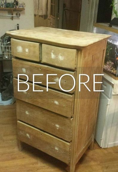 an old dresser has been transformed into a fish tank