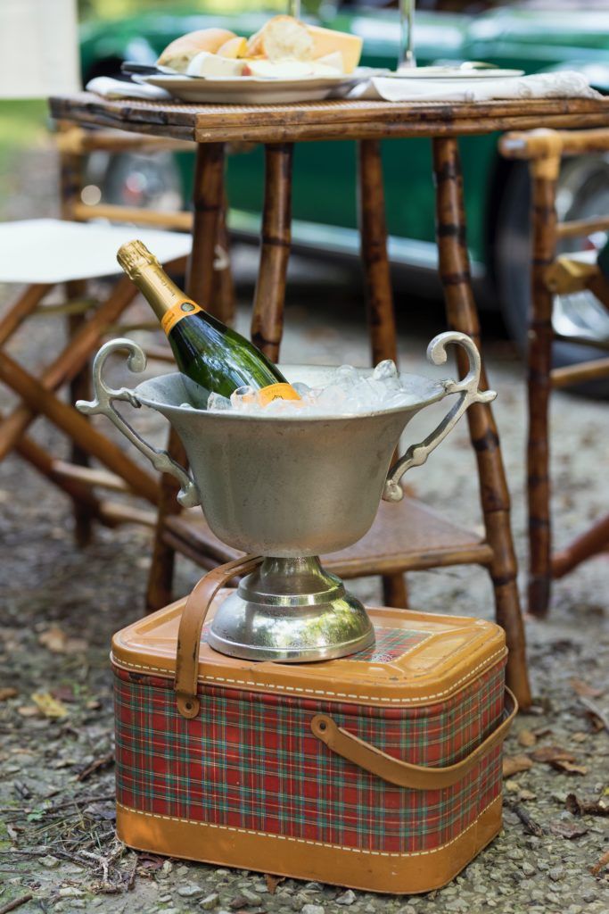 a wine cooler sitting on top of a wooden table