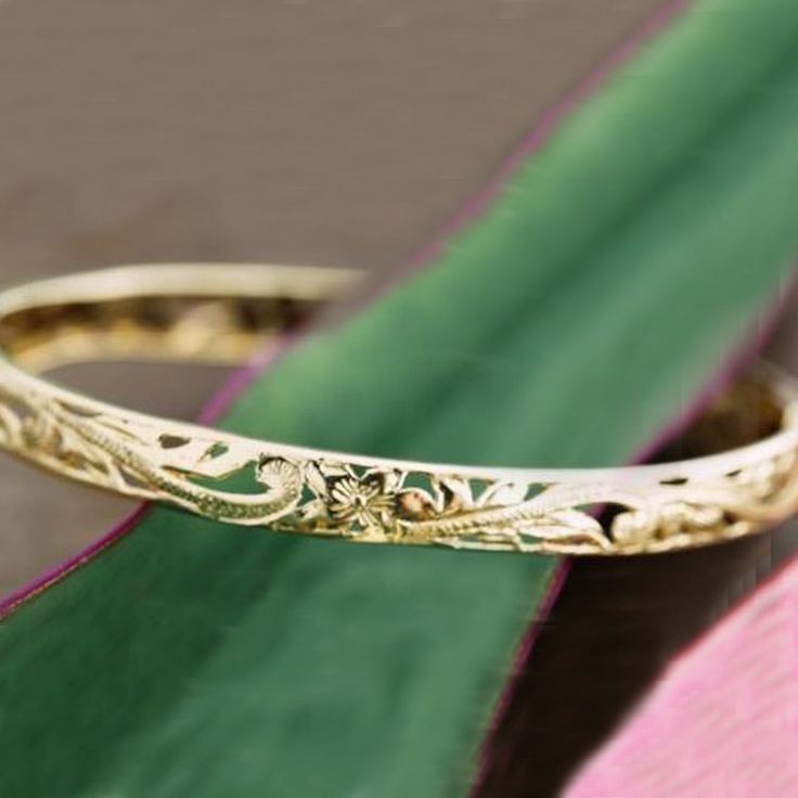 14K Hinged Gold Scroll Plumeria Leaf Bracelet Elegant Carved Bangle For Weddings, Elegant Adjustable Carved Bangle, Elegant Carved Bracelets As Gifts, Elegant Carved Bracelets For Gifts, Elegant Carved Bracelet, Elegant Carved Adjustable Bracelet, Exquisite Carved Yellow Gold Jewelry, Elegant Adjustable Carved Bracelet, Exquisite Carved Gold Jewelry