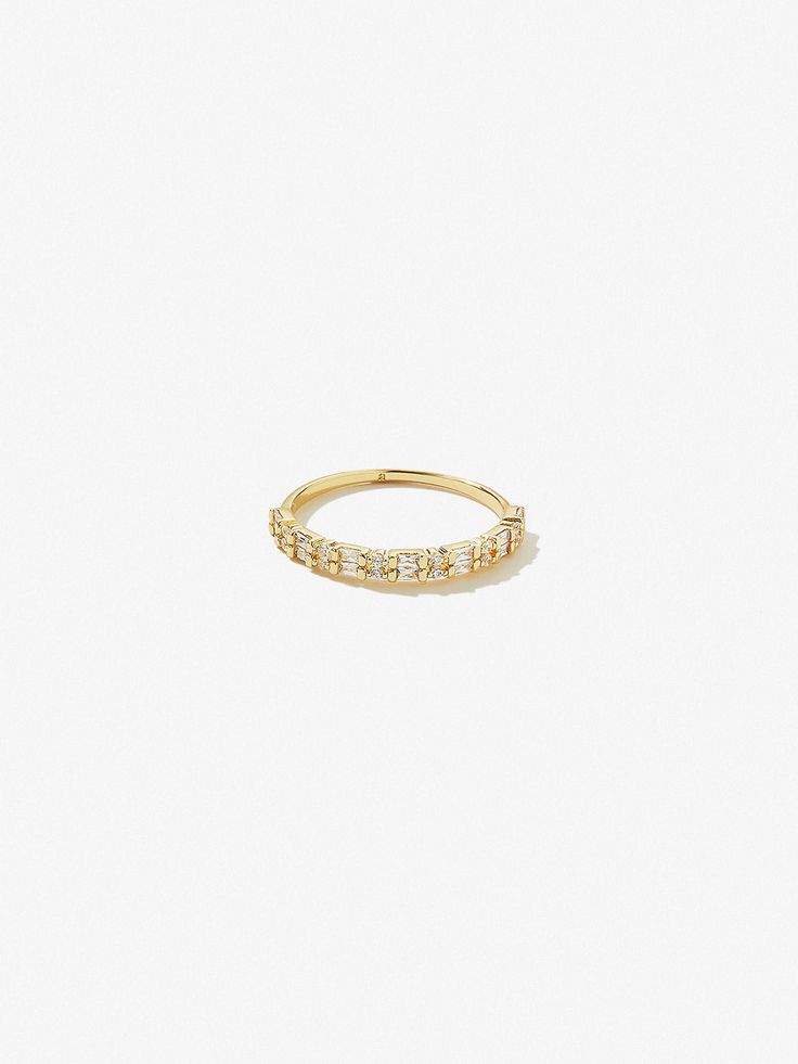 All great things come in dainty packages, especially when you take home this stackable ring. Our Darcy ring is dipped in 14K gold and features a mixture of baguette-cut and round-cut cubic zirconia gemstones. This stackable ring obviously loves company, so pair Darcy with bold rings, dainty rings, maybe some silver ringsthe choice is yours.  Dipped in 14K gold  Set with a variety of cubic zirconia gems  365-day warranty Everyday Gold Stackable Initial Ring, Gold Stackable Initial Ring For Everyday, 14k Gold Stackable Crystal Open Ring, Everyday 14k Gold Crystal Ring, Delicate Stackable Yellow Gold Crystal Ring, Everyday Stackable 14k Gold Crystal Ring, Stackable Yellow Gold Crystal Ring In 14k, Stackable Yellow Gold Crystal Ring For Everyday, Yellow Gold Stackable Crystal Ring In 14k