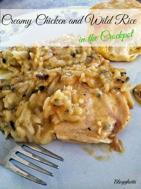 a white plate topped with chicken and wild rice